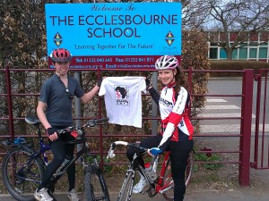 Riders prepare for a training ride from school